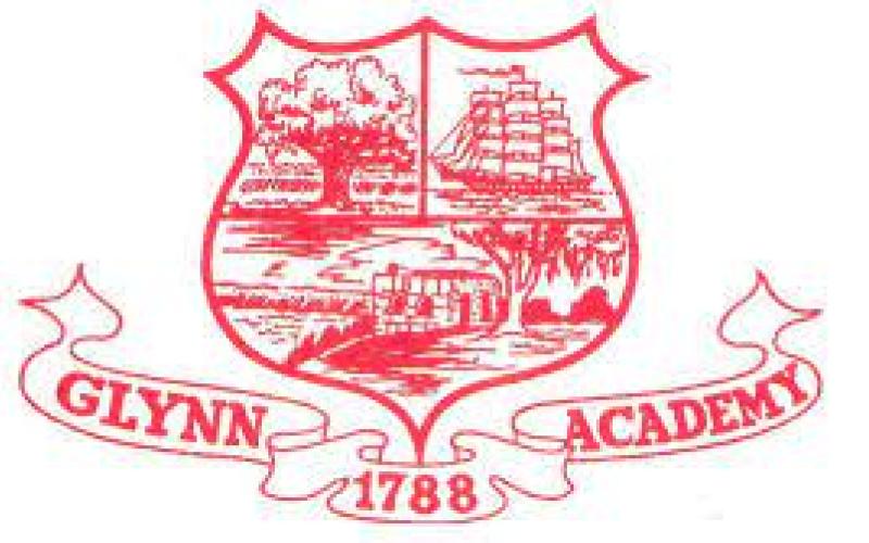 Red shield logo with tree, ship, and building images, text reads "Glynn Academy 1788."